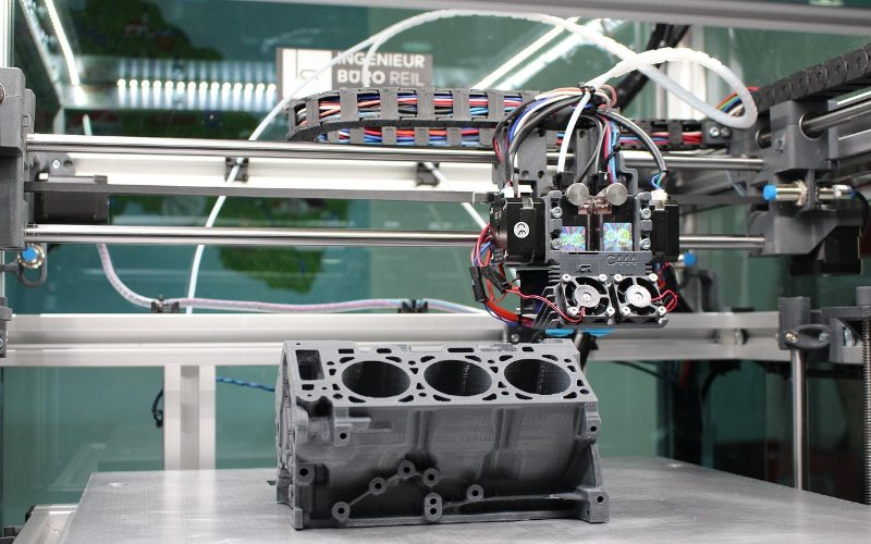 Industrial 3D printing machine in motion